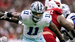 Grado comercial de la NFL: la persona de vaquero intercambia a la persona de mica