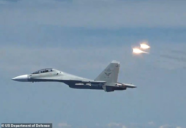 103132263-15207957-A_Chinese_fighter_jet_file_image_released_flares_in_a_dangerous_-m-7_176094640291.jpeg