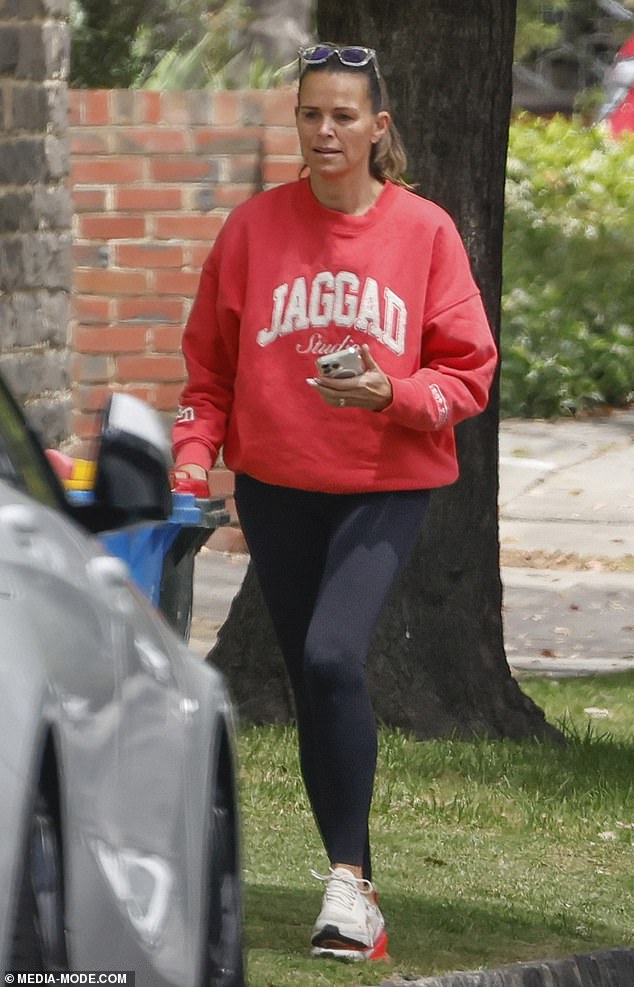 104965183-15408293-Jo_Silvagni_takes_out_the_trash_outside_the_home_where_her_rapis-a-5_176654424170.jpeg