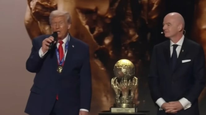 69336c2591438-donald-trump-terima-penghargaan-fifa-peace-prize_665_374.jpg