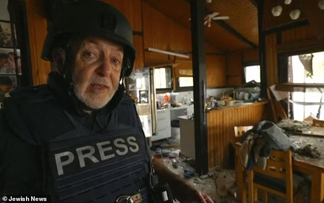 105186895-15429529-Pictured_The_BBC_s_Jeremy_Bowen_reporting_from_inside_the_Horens-a-33_17673782449.jpeg