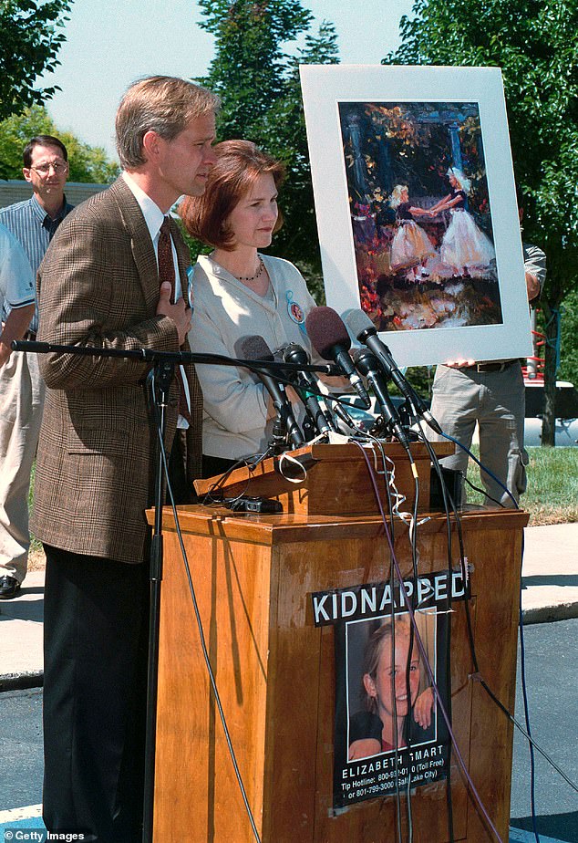 101121477-15536655-Lois_and_Ed_Smart_holding_a_press_conference_on_June_20_2002_day-a-1_177041259761.jpeg