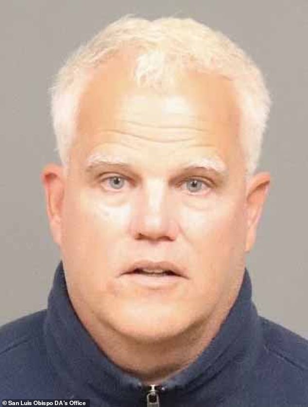 106104571-15527413-Andrew_Gustafson_60_seen_in_his_mugshot_from_August-a-1_1770220232493.jpg