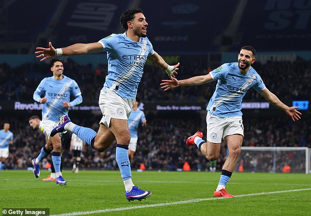 106114237-15528353-Omar_Marmoush_celebrates_scoring_for_Manchester_City_in_their_3_-m-81_17702421766.jpeg