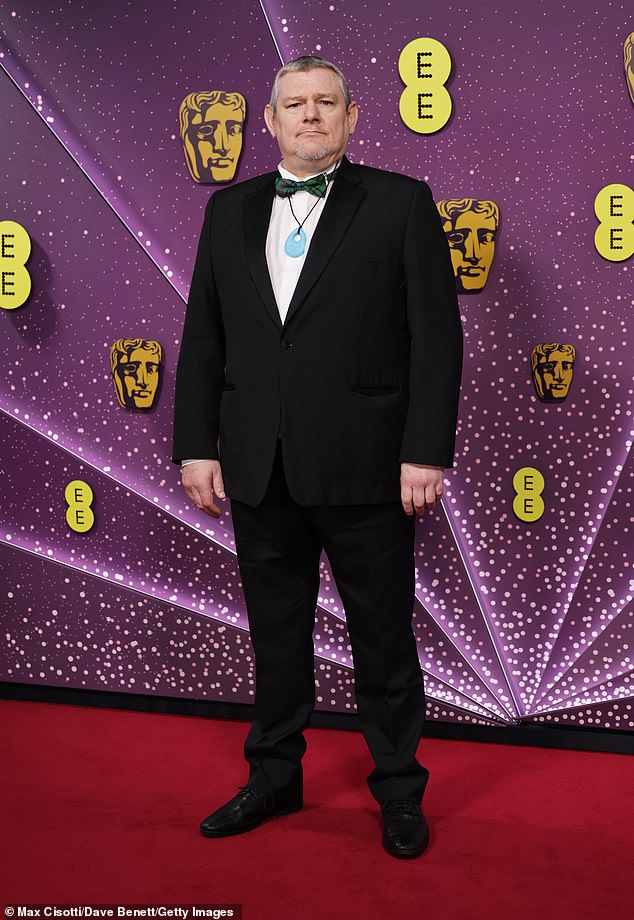 106664749-15590503-John_Davidson_at_the_Bafta_Film_Awards_at_the_Royal_Festival_Hal-a-7_177202041501.jpeg