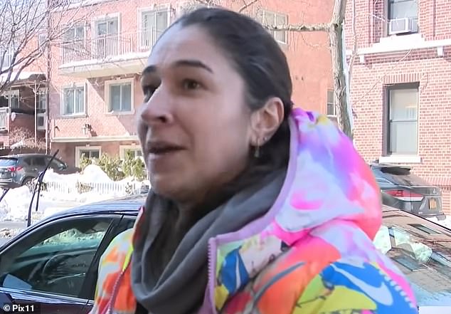 106731493-15598635-Paula_Macias_caught_her_neighbor_or_camera_piling_snow_onto_her_-a-25_17722175974.jpeg