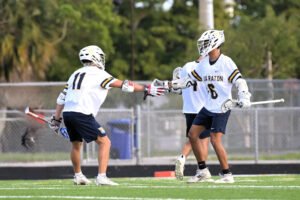 El lacrosse masculino de Boca Raton vence a su rival de la ciudad para ganar el título distrital
